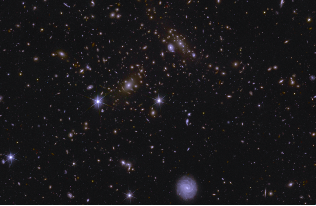 Euclid Deep Field South, 70x zoom  Deze afbeelding toont een gebied van Euclid's Deep Field South. Het gebied is 70 keer ingezoomd vergeleken met het grote mozaïek. Credit: ESA/Euclid/Euclid Consortium/NASA/Cuillandre/Berti/ Anselmi