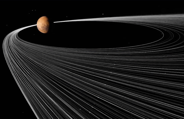 Computersimulaties laten zien dat een planetoïde die te dicht bij Mars komt kan verbrijzelen en een ring van puin achterlaat. © NASA/Youtube